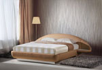 Тапицирана спалня в цвят светъл карамел с табла - полукръг  